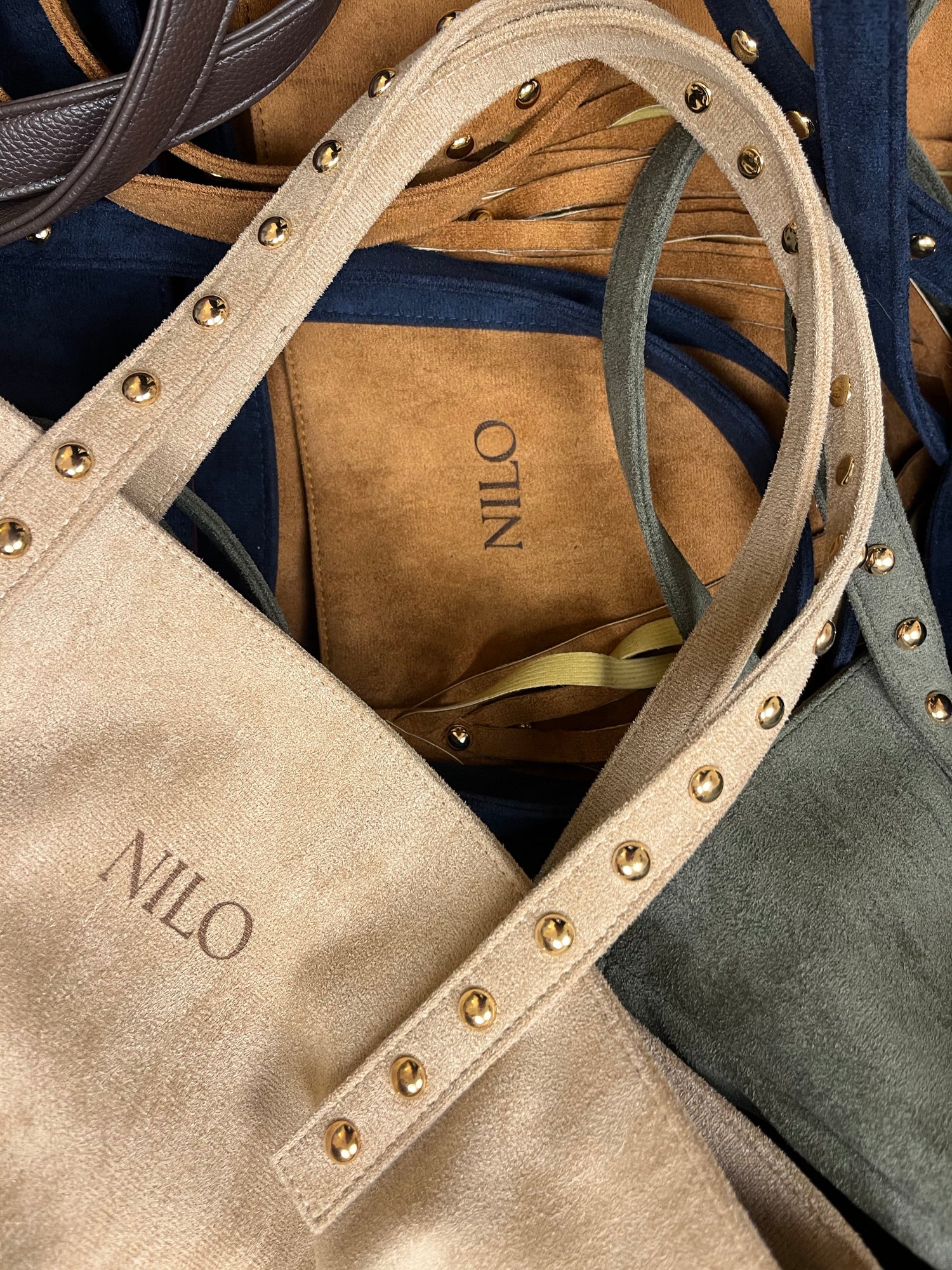 Nilo Suede studs Collection